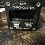 Davtron Model Clock (chronometer) P/n M877-5V. Fixed Price $450.00.